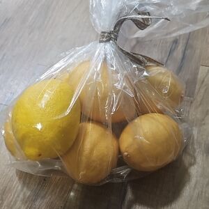 Faux Lemons in Clear Bag